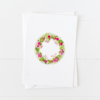 holiday wreath Christmas card with holly and holiday flowers and pointed flap envelope